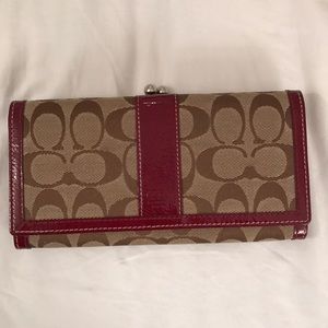 Brown and red Coach wallet